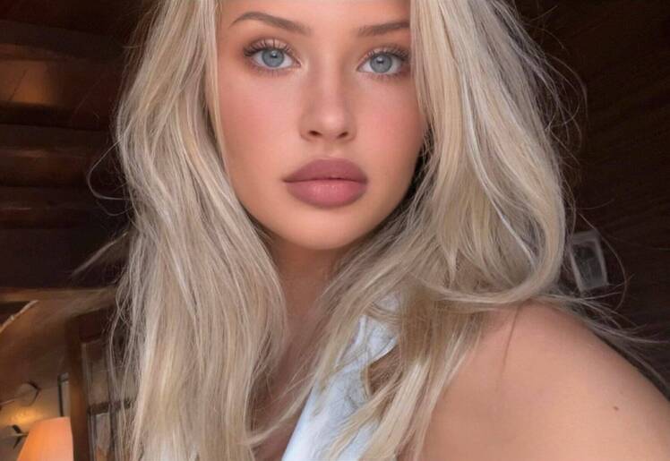 Former Hockey Goalie Mikayla Demaiter Nearly Busts Out of Unbuttoned