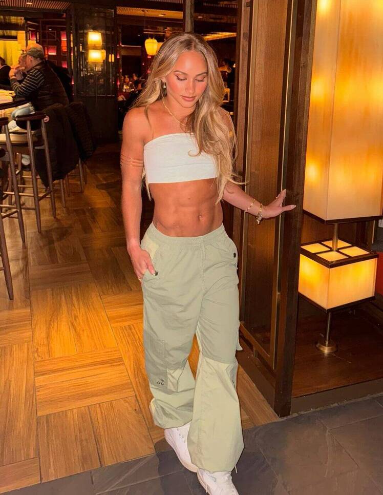 Cheer Star Gabi Butler Flaunts RockHard Abs in Tiny Bandeau